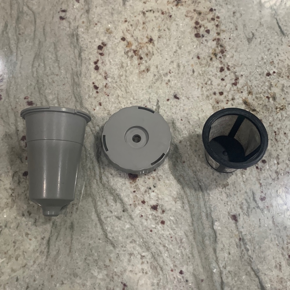 Keurig ground coffee filter with machine attachment.